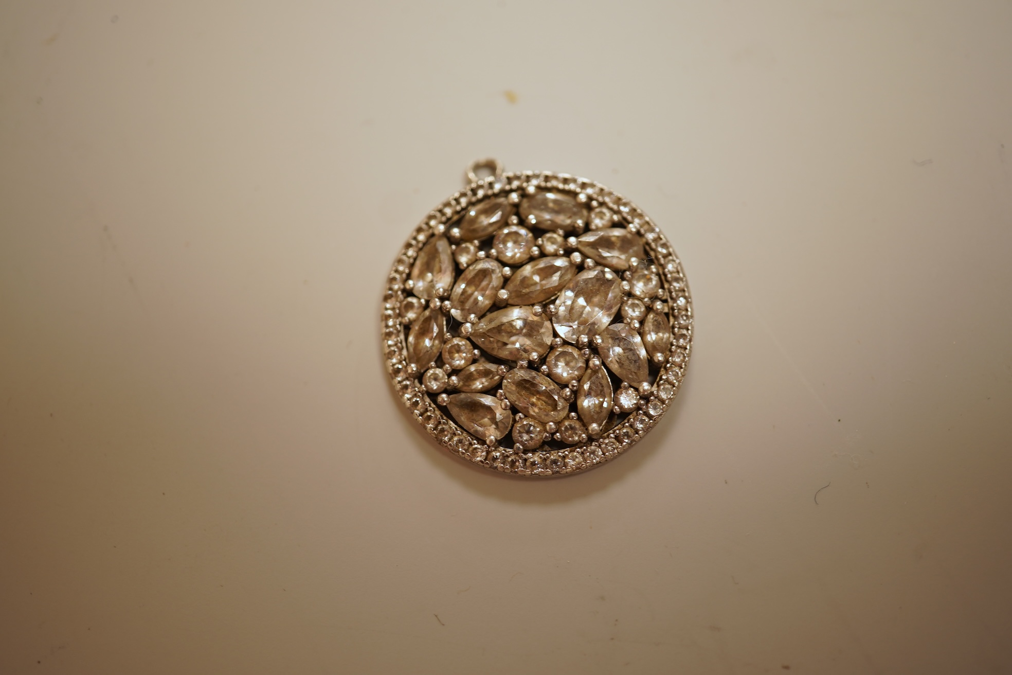 A small group of assorted jewellery including a gold plated curb link bracelet, silver brooch, simulated pearl necklace and costume.